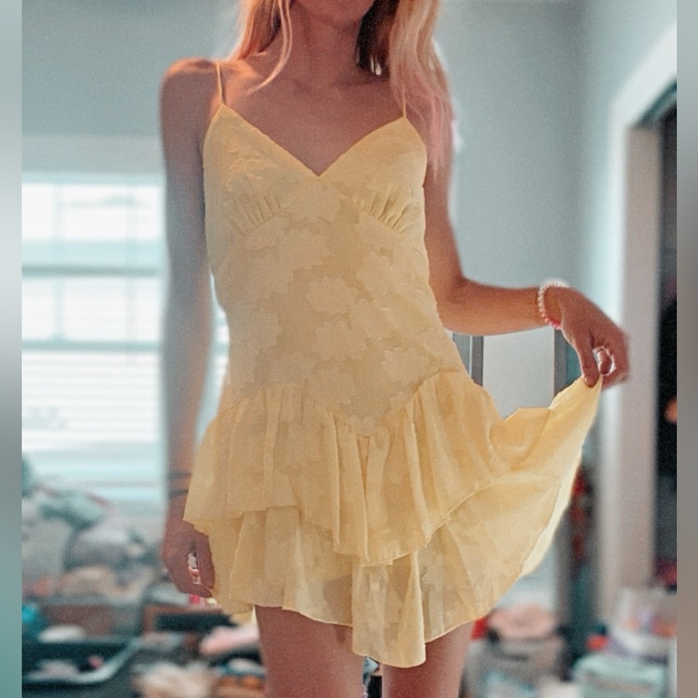 NWT yellow floral lace dress with spaghetti straps and asymmetrical bottom